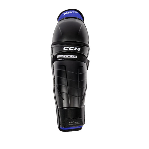 Black shin guard with blue accents on a white background