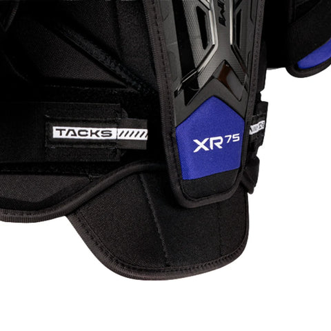 Black protective gear with 'Tacks' and 'XR75' branding on a white background