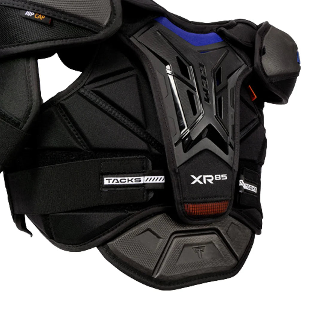 Close-up of a black hockey shoulder pad with blue and orange accents, featuring the TACKS XR85 branding on a white background.